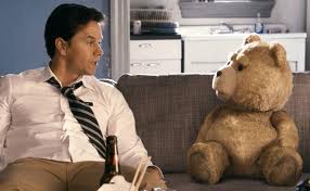 Marky Mark talks to a teddy bear